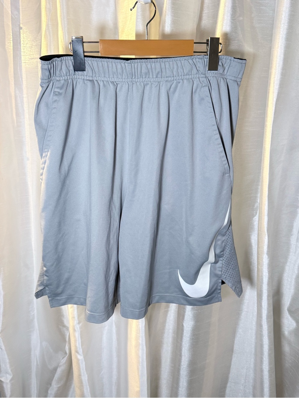 Nike Light Gray Athletic Shorts with White Swoosh